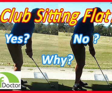 Should my irons sit flat on the ground at address in golf