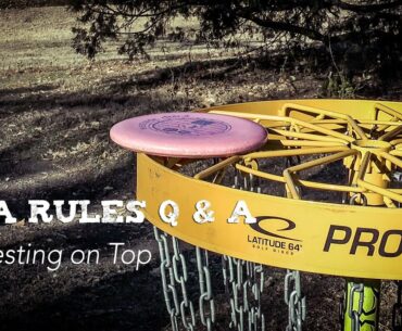 PDGA Disc Golf Rules Q & A | Disc Resting on Top