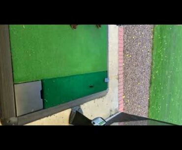 Lad uses his phone as a golf tee and smashes it