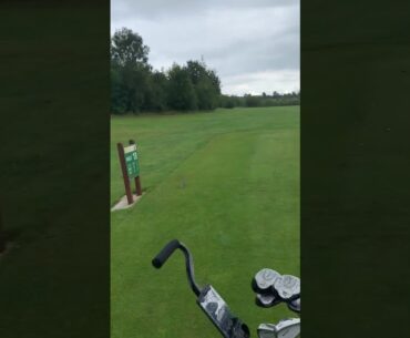 Lad scuffs his golf swing, then throws his club and gets it stuck in a tree