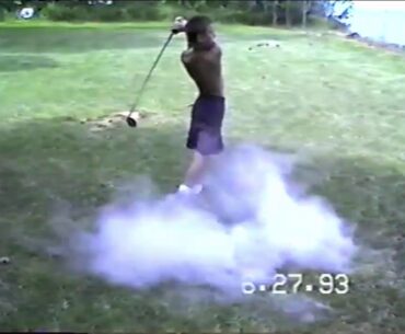 Chris hits a golf ball into the lake − Angelo Family − Conneaut 1993