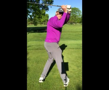 Quirky angles to study the golf swing: study from behind.