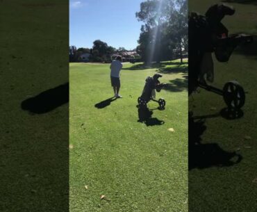 chopping in a fairway divot on the golf course