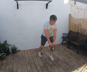 Kettlebell Golfers Twist Staggered Stance Away From Front Leg