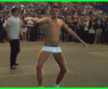 Guy takes clothes off and runs into a Drake concert dance-off