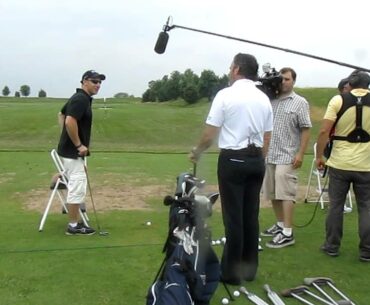 Soldier w/one-leg hitting golf balls