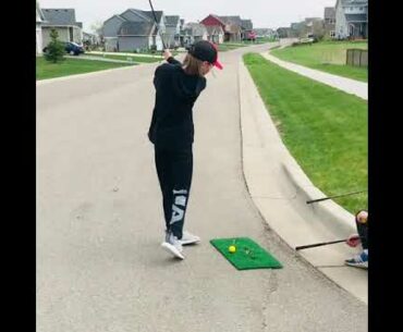 Playing golf in our neighborhood with foam golf balls