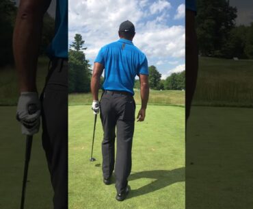 Tiger Woods tee shot with Tom Gillis