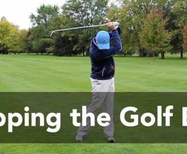 How to Stop Topping the Golf Ball | Golf Instruction | My Golf Tutor