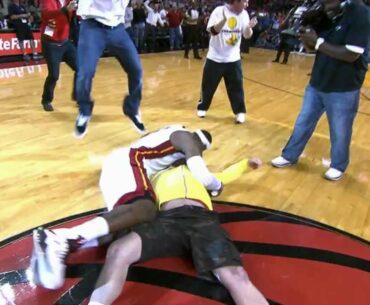 LeBron tackles Heat fan who hits $75,000 shot!