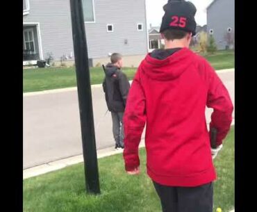 Golfing in our neighborhood with foam golf balls.