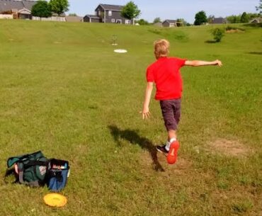 Son (Nearly Age 11) Throwing Disc Golf Hunter's Black Zombie Disc Golf Putter