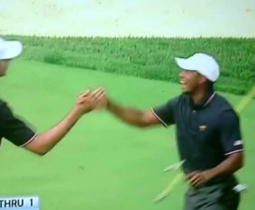 Tiger Woods "High Fives" Matt Kuchar At Presidents Cup 2013