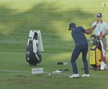 Rickie Fowler and Webb Simpson warm up on the range at Rocket Mortgage 2020