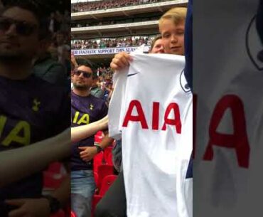 Tottenham’s Ben Davies gives shirt to lad (close up)