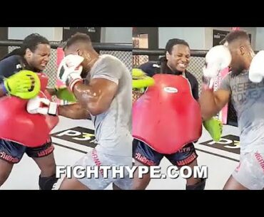 (WHOA) FRANCIS NGANNOU FRIGHTENING POWER MAKES TRAINERS GRIMACE & MOVE OUT THE WAY: "HE HITTIN HARD"