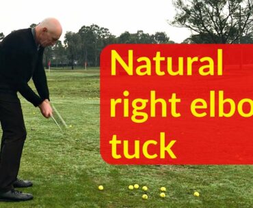 Right elbow tucked in golf swing