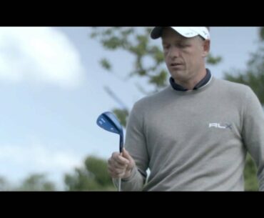 Luke Donald tests the feel of his new Mizuno T7 Wedges