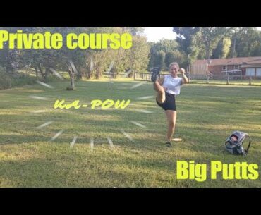 Big putts going down at the Sinclairs' private disc golf course