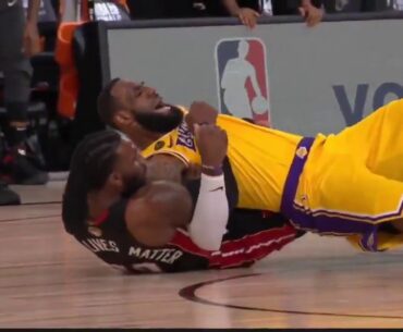 Jae Crowder holds onto LeBron James in a loose ball scramble