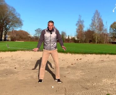 Hoe sla ik de bal uit een fairway bunker