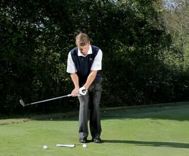 Todd Sones: Stand to the Handle for Tight Chipping | GOLF.com