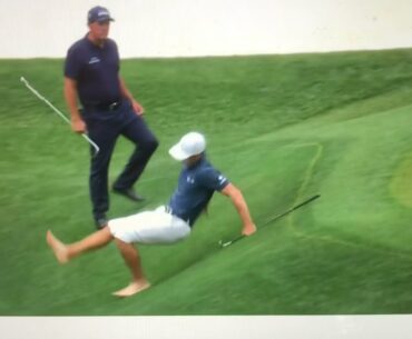 Billy Horschel slips and slides down the hill at The Masters...
