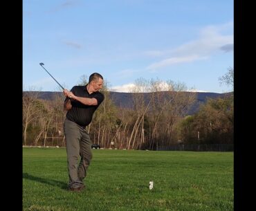 Golf Trickshot Hitting The Top Ball From A Sleeve Of Golf Balls