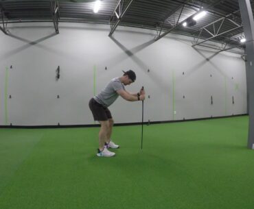 Pelvic titls in golf stance supported