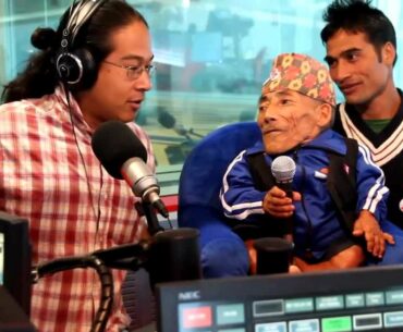 World's shortest man playing golf with the world's shortest golf clubs set