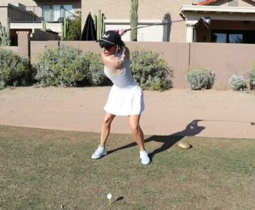 Golf Girl-Paige Spiranac play outdoor wearing white Tanktop , swing and concentration is very good 1