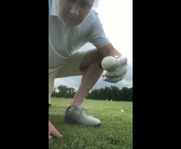 Hitting an old golf ball with a chunk out of it