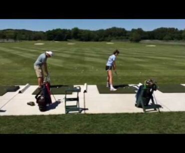 Driving range, my youngest and oldest tee off  -  Bella and Dominik