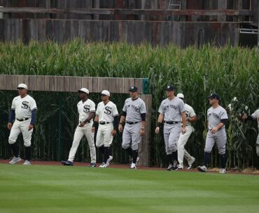 Kevin Costner leads the Yankees and White Sox out of the cornfield at MLB at Field of Dreams!