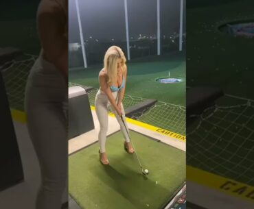 Sexy Girl Playing Golf