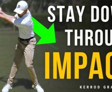 How to Stay Down Through Impact in The Golf Swing