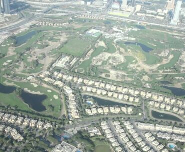 Lady Golfers Amy Boulden and Kelsey MacDonald flying above Dubai in a Seawings plane