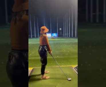 Wife practices golf swing at top golf #girl #golf #shorts #topgolf #shots