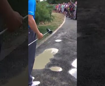 Jordan Spieth drops into a PUDDLE! 😳