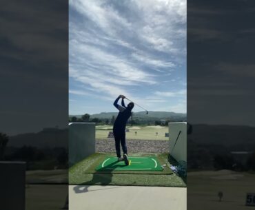 How to swing a golf club.