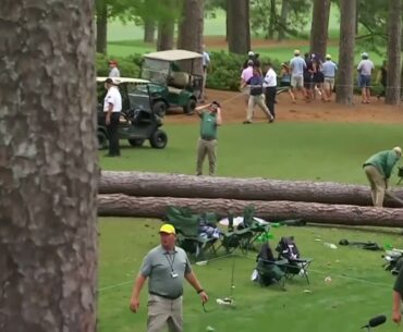 Crazy moment storms bring down trees at Masters as second round is suspended