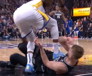 Draymond Green ejected for stepping on Domantas Sabonis after he grabbed his leg