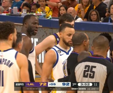 Draymond Green was heated after Dennis Schroder pulled his leg running around the screen