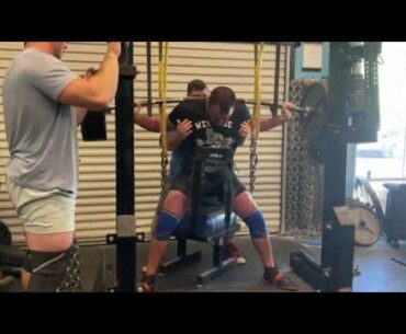 Matt Wallace Squatting 415+80 lbs of chains x 3 onto a parallel box