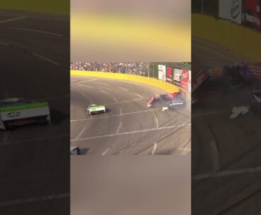 Tim Devos flips and lands on roof after contact with Scott Root at Berlin Raceway.