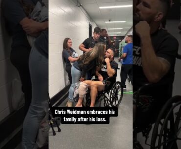 Weidman embraces his family after #UFC292 ❤️