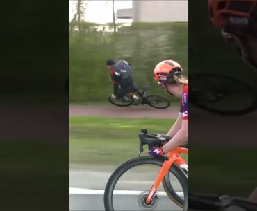 Spectator Crashes While Riding Alongside Peloton! #shorts