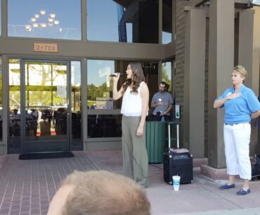 Bella singing the National Anthem at Special Olympics golf tournament