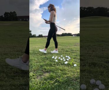 Girl Practicing Golf: Beginner Wedge Practice on Hillside