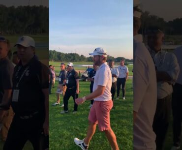 Kalle Samooja greeted by Greg Norman after winning LIV Golf Promotions